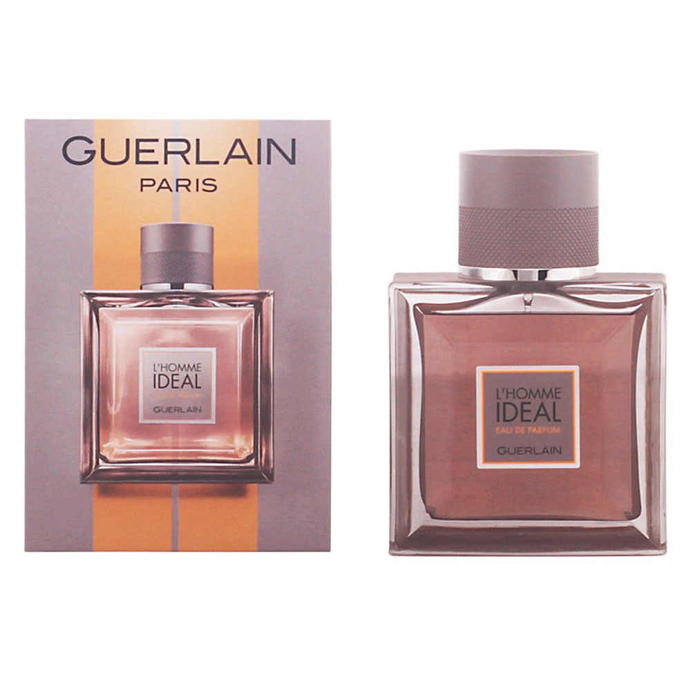 Guerlain L'Homme Ideal Eau de Parfum fles, bruine dop. Product en verpakking naast elkaar. Tekst: L'Homme Ideal, Guerlain.