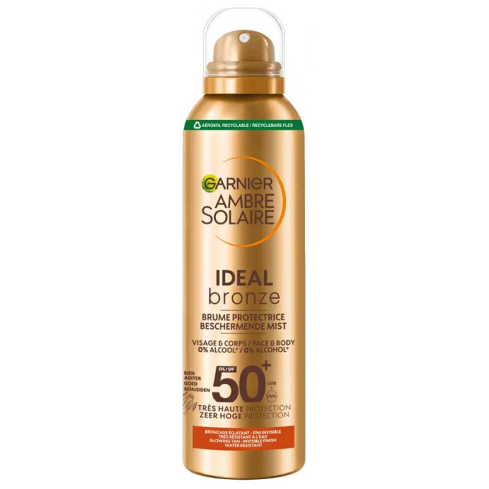 Gouden sprayfles. Opschrift: Garnier Ambre Solaire Ideal Bronze, SPF 50+. Voor gezicht en lichaam.
