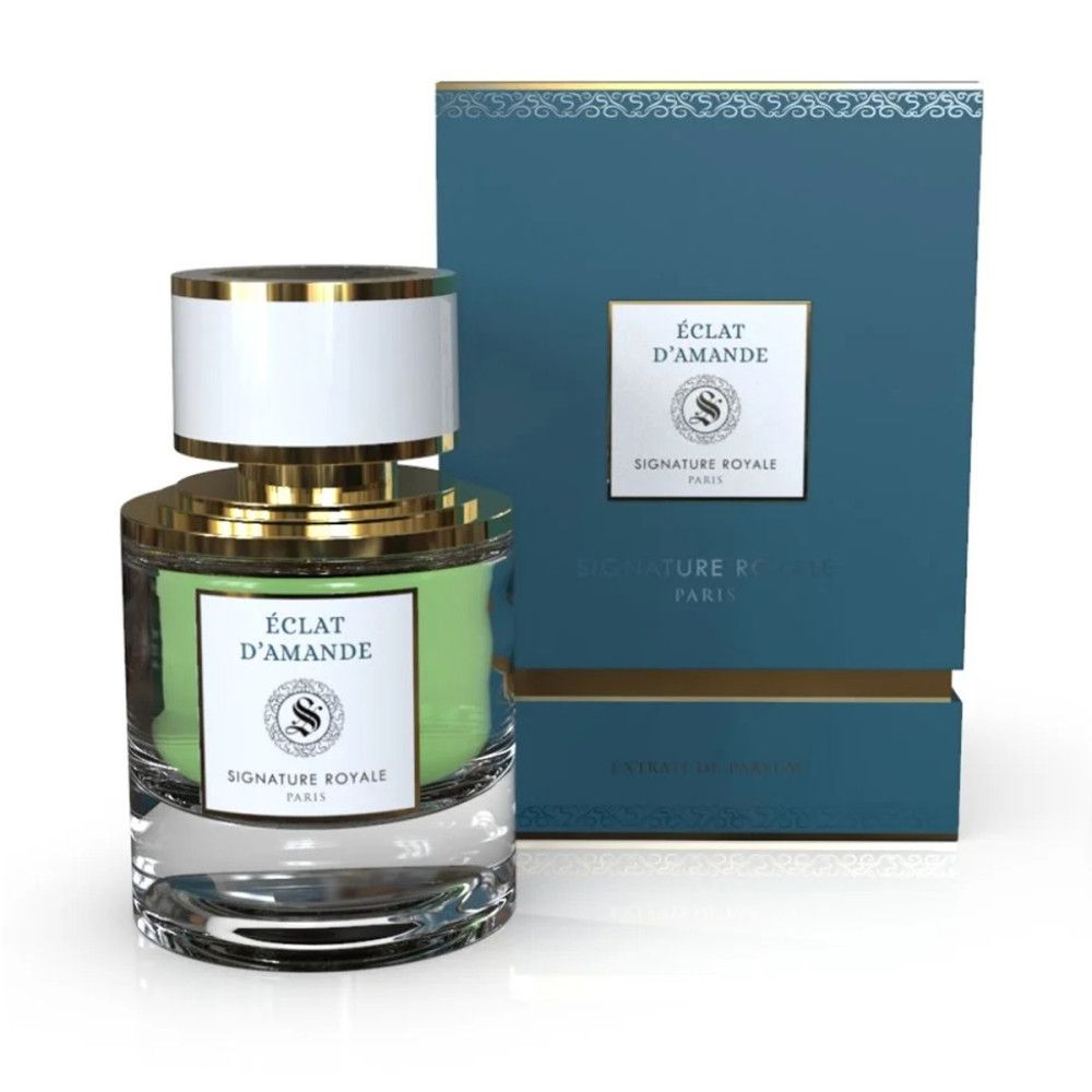 Flacon en verre avec bouchon doré et capuchon blanc. Inscription : ÉCLAT D'AMANDE, SIGNATURE ROYALE PARIS. Boîte bleue.