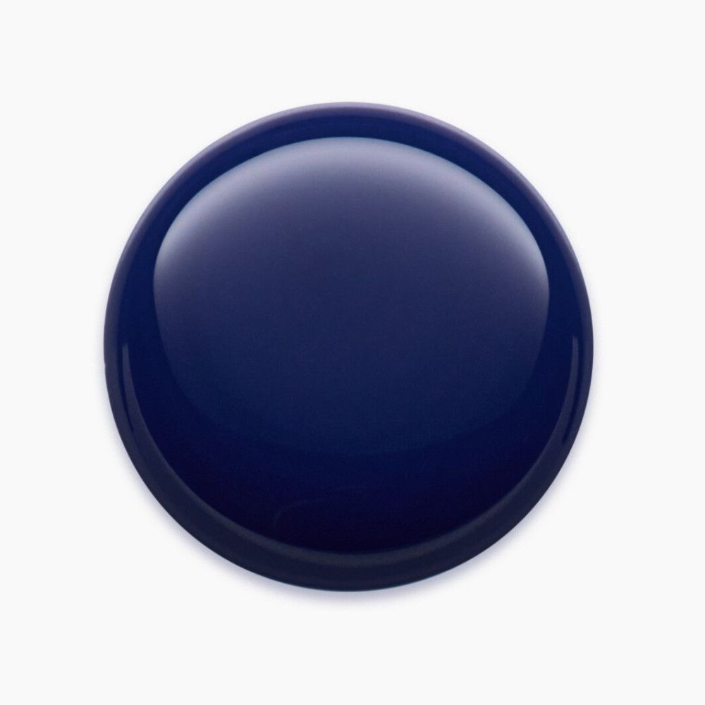 Donkerblauw, rond object met glanzend oppervlak.