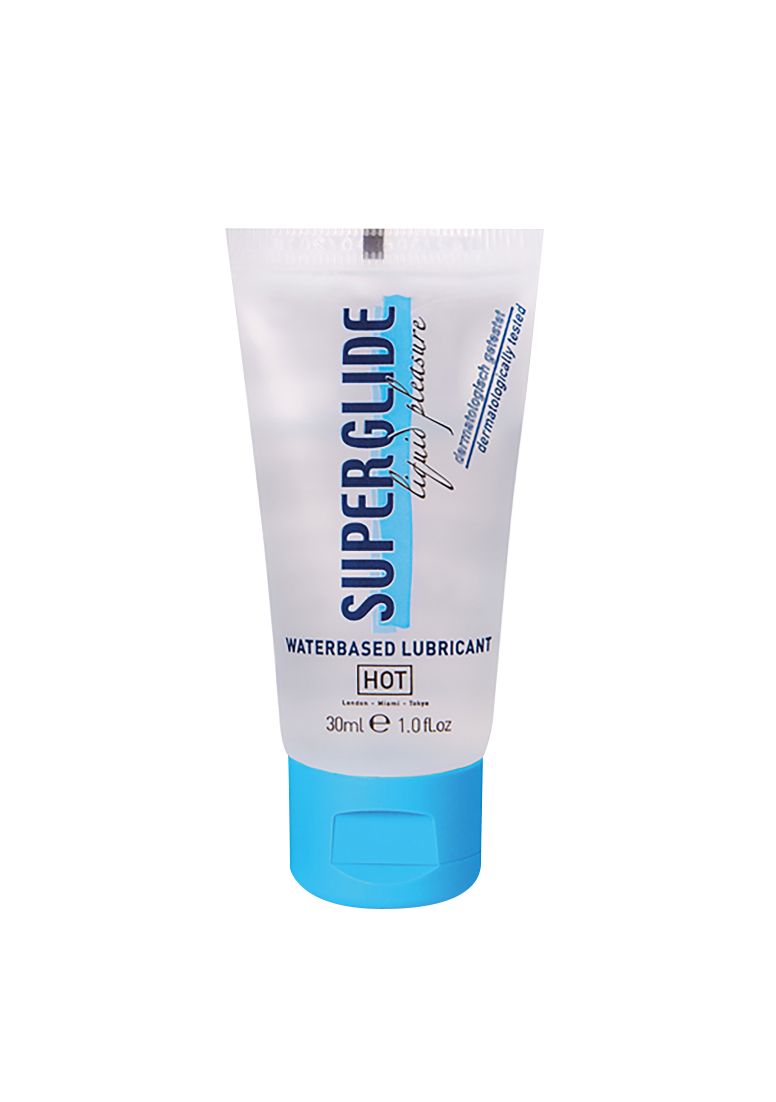 Transparante tube met blauwe dop. Opschrift: SUPERGLIDE liquid pleasure WATERBASED LUBRICANT. 30ml. HOT. Dermatologisch getest.