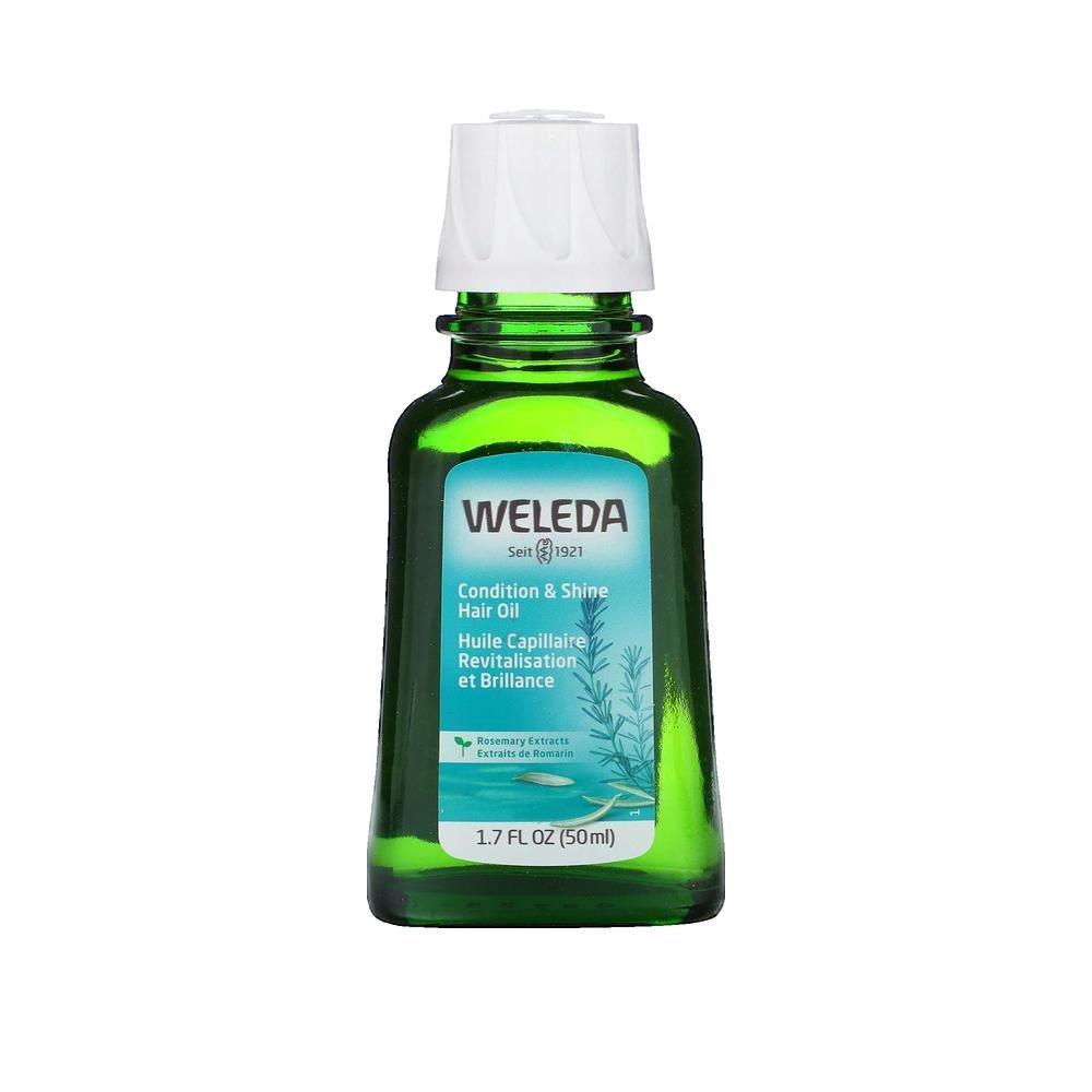 Flacon en verre vert avec bouchon blanc. Inscriptions: WELEDA, Condition & Shine Hair Oil, 1.7 FL OZ (50ml).