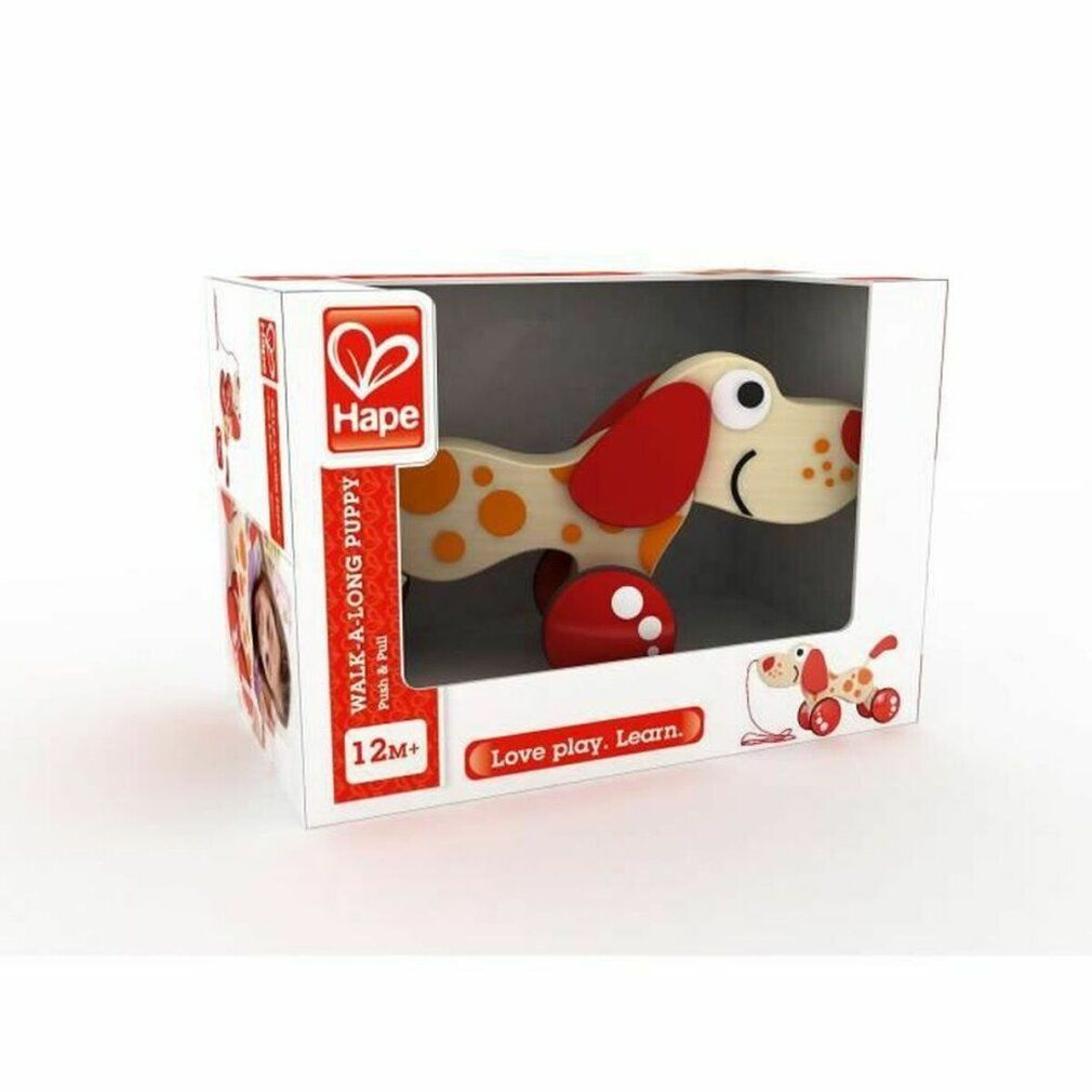 Hape Trekhond Pepe in verpakking. Witte doos met productafbeelding, logo, tekst "WALK-A-LONG PUPPY" en leeftijd.