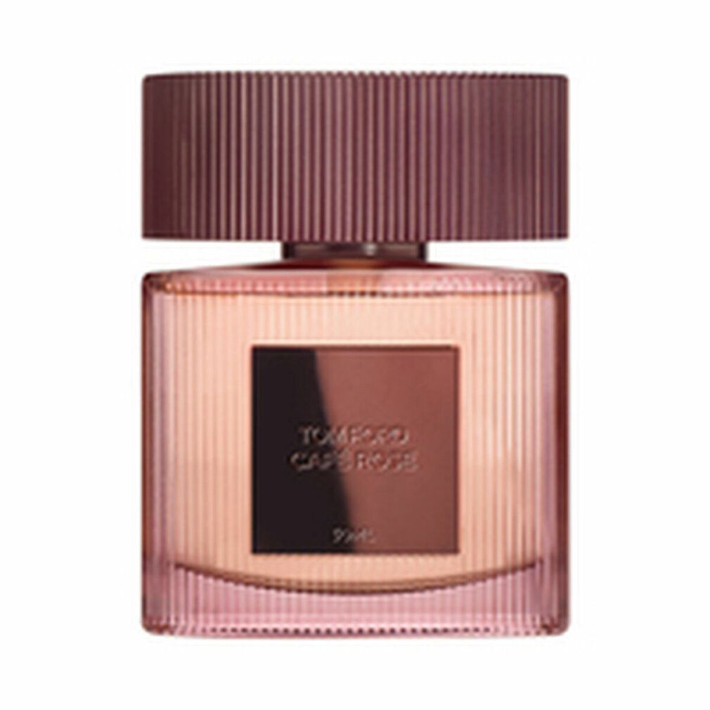 Flacon rose avec étiquette "TOM FORD Café Rose". Le flacon a un bouchon marron.
