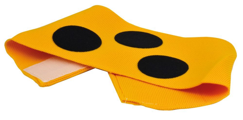 Brassard jaune avec fermeture velcro et trois cercles noirs. Matériau textile.