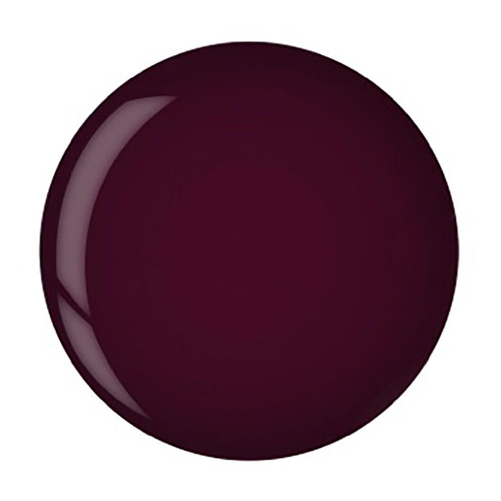 Tache ronde et brillante de couleur rouge foncé.