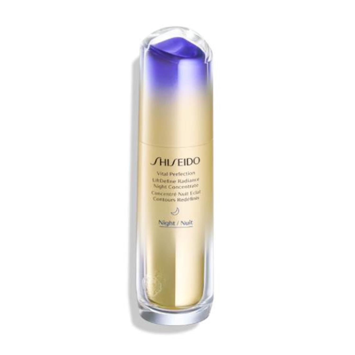 Cilindrische fles met paars-gouden kleurverloop. Opschrift: Shiseido Vital Perfection LiftDefine Radiance Night Concentrate.