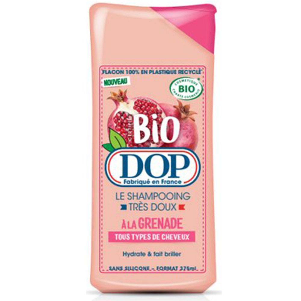 Roze shampoo fles met granaatappel illustratie. Tekst: Bio DOP, Très Doux, À la Grenade, Tous types de cheveux.