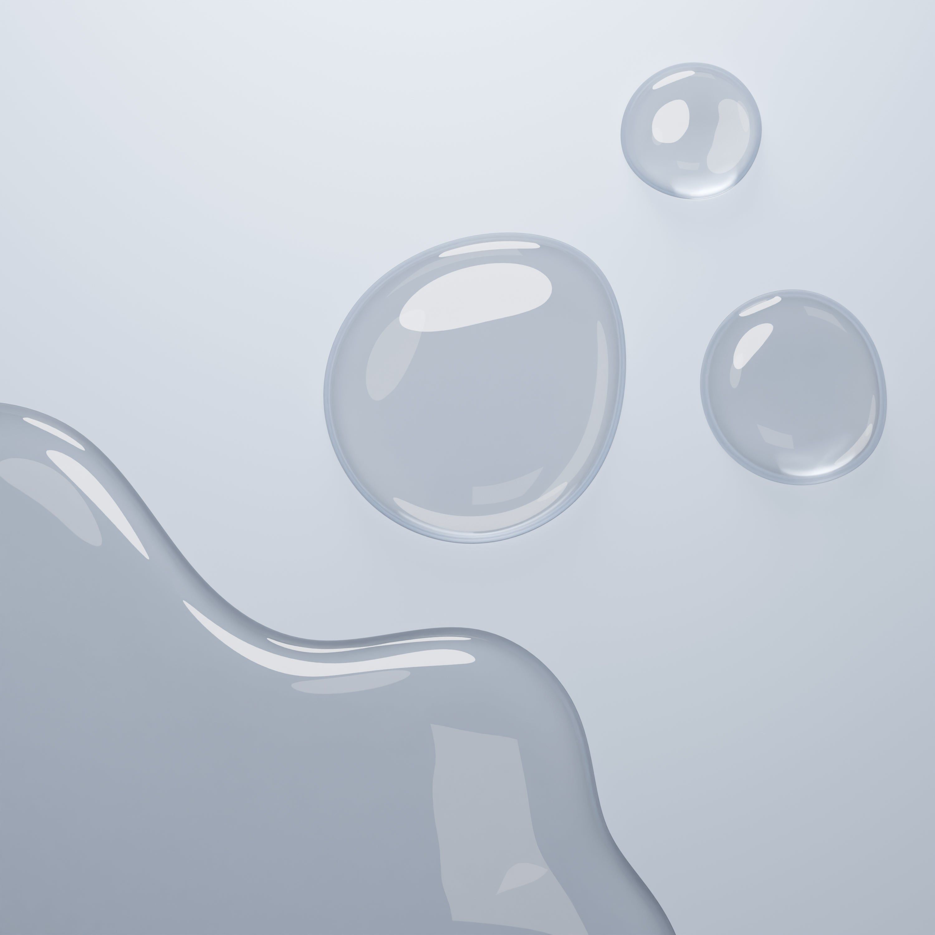 Trois gouttes d'eau et une vague sur fond clair.