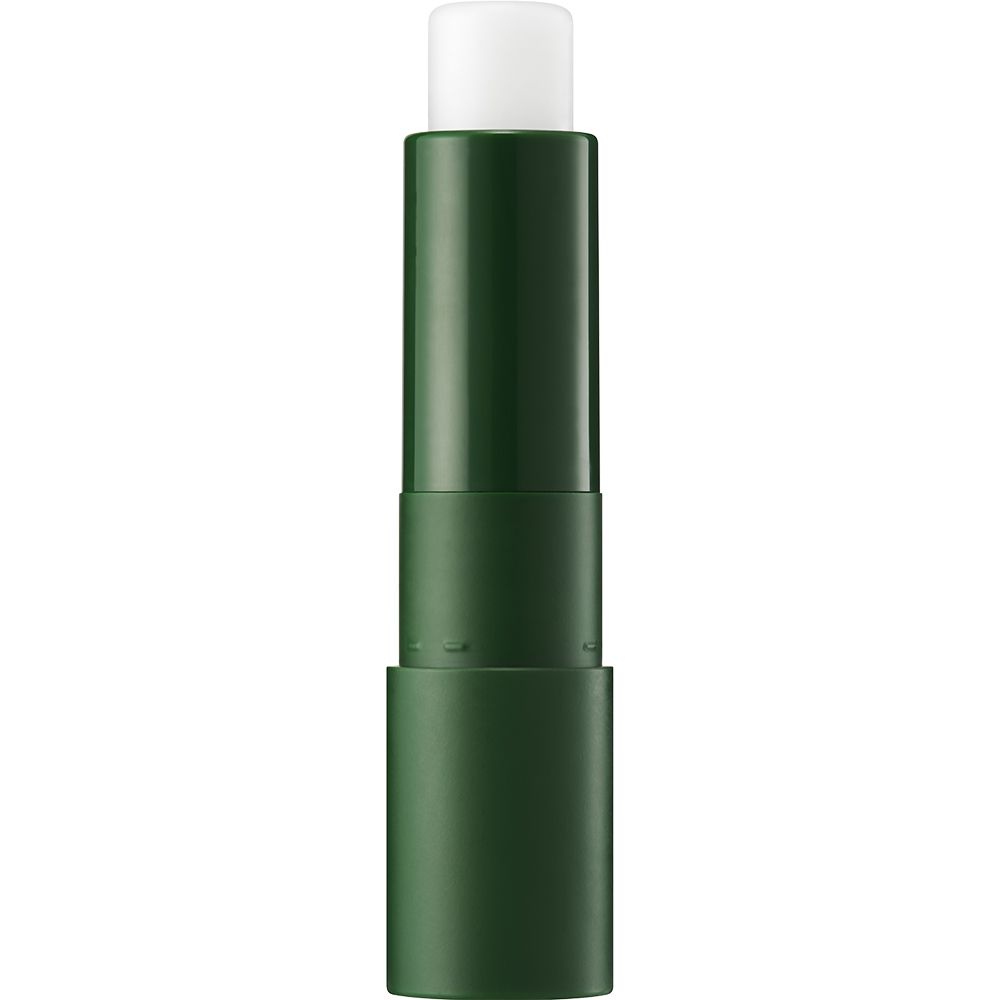 Groene lipbalm-stick, geopend. Witte balsem zichtbaar.