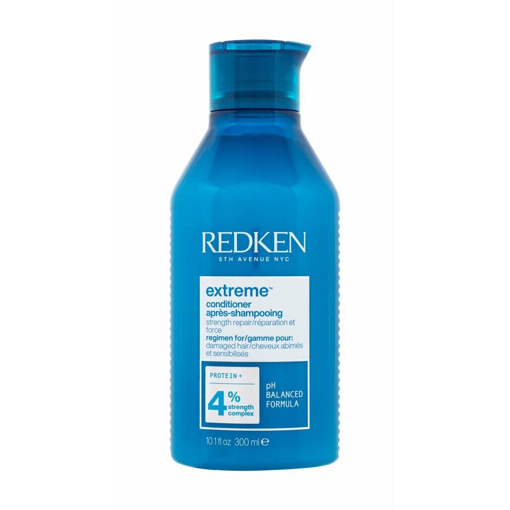 Blauwe fles Redken Extreme Conditioner. Opschrift: Extreme, Conditioner, pH Balanced Formula. 300ml.