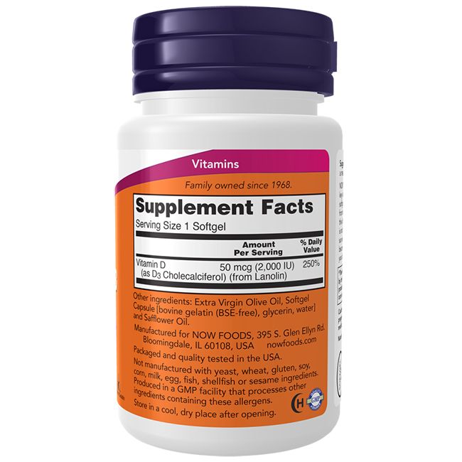 Flacon blanc de gélules de vitamine D3, bouchon violet. Inscription : Vitamine D, 2 000 UI. Contient 120 gélules. Étiquette orange avec informations.