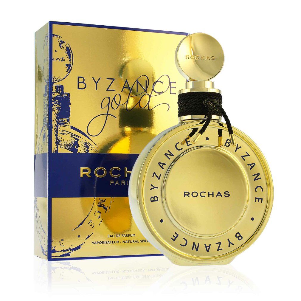 Boîte et flacon dorés. Inscription: BYZANCE Gold, ROCHAS PARIS. Flacon avec ruban noir.