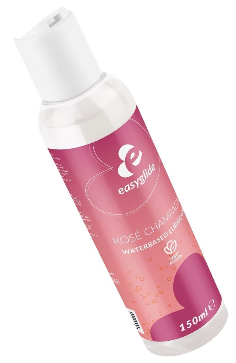 Vue en biais d'un flacon transparent avec bouchon blanc. Étiquette rose avec nom et logo. Label vegan. 150ml.