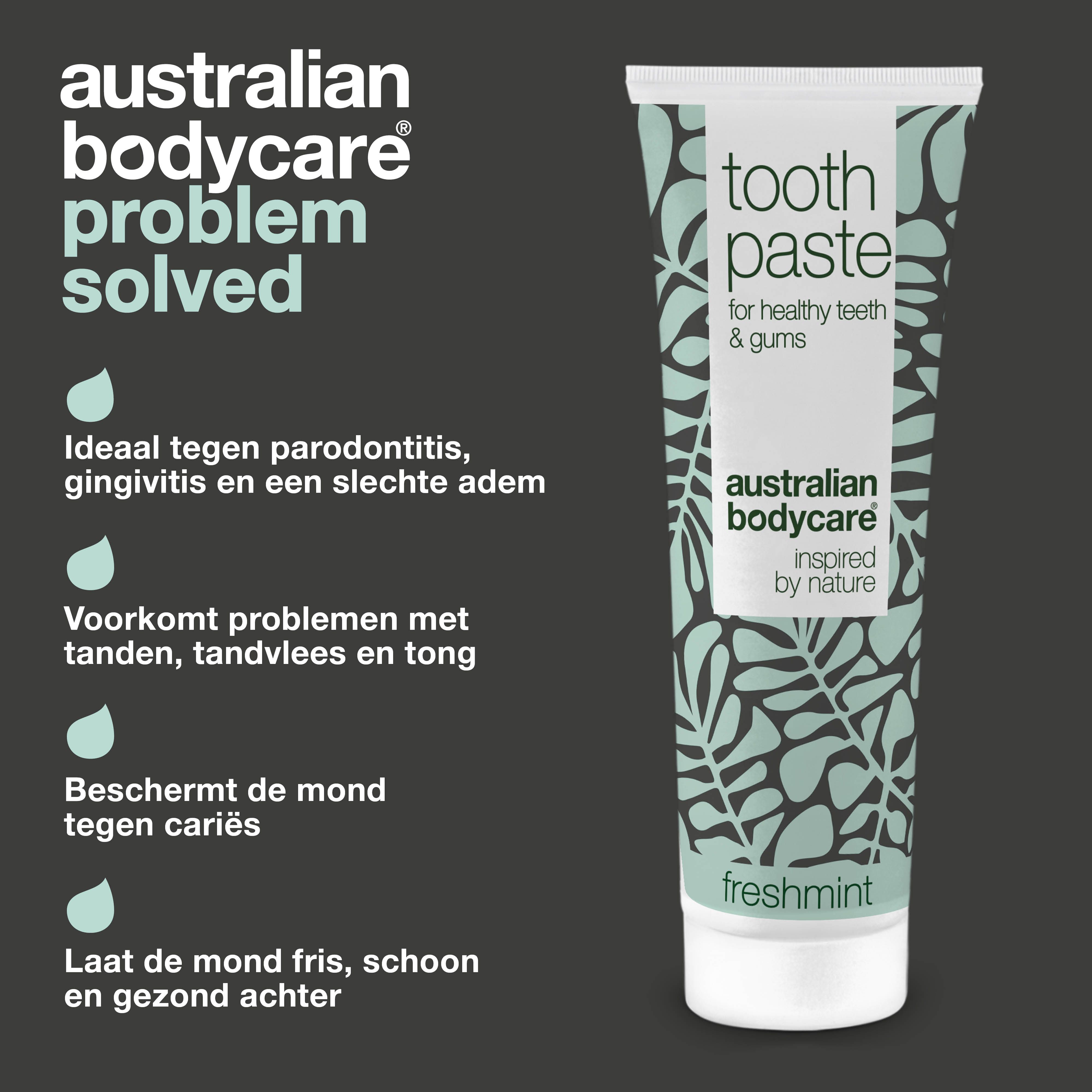 Tandpastatube met bloemenpatroon. Tekst: Toothpaste, voor gezonde tanden & tandvlees, Australian Bodycare, Freshmint. Druppels.