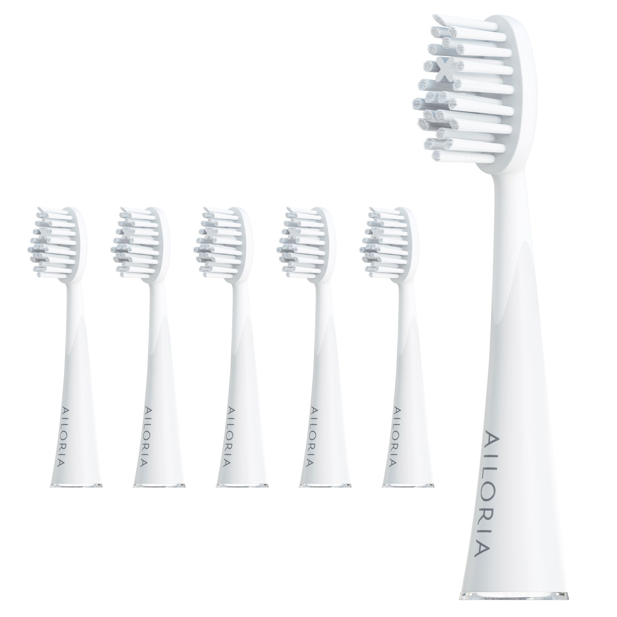 Six têtes de brosse de rechange blanches AILORIA SHINE BRIGHT. Une seule en gros plan, d'autres en arrière-plan. Inscription AILORIA.