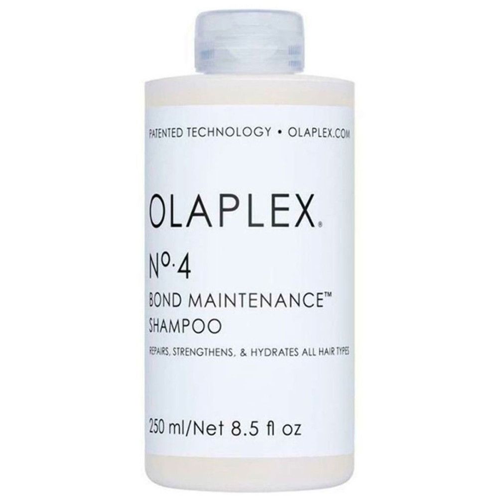 Flacon de shampooing OLAPLEX No. 4 Bond Maintenance. 250 ml/8.5 fl oz. Texte : REPAIRS, STRENGTHENS & HYDRATES ALL HAIR TYPES.