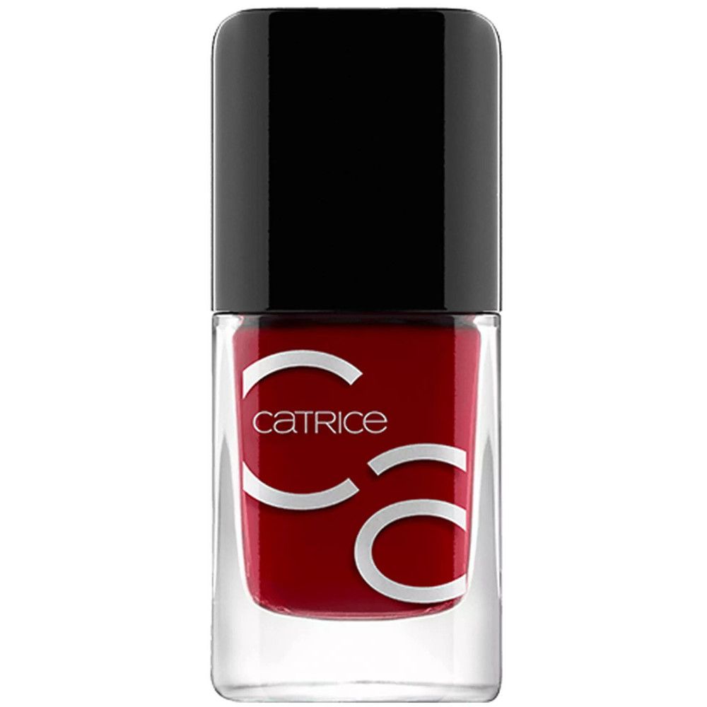 Flacon de vernis à ongles avec contenu rouge et bouchon noir. Catrice est sur le flacon.