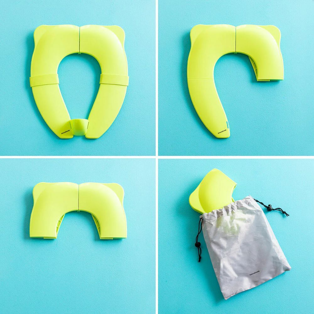 Vier aanzichten van de groene, opvouwbare toiletverkleiner voor kinderen. Met draagtas.