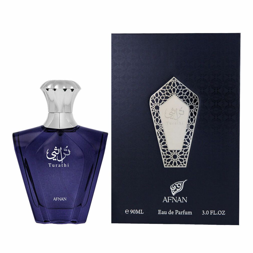 Flacon de parfum bleu et boîte. Inscription "Turathi" et "AFNAN". Boîte avec motif argenté et informations sur le produit.