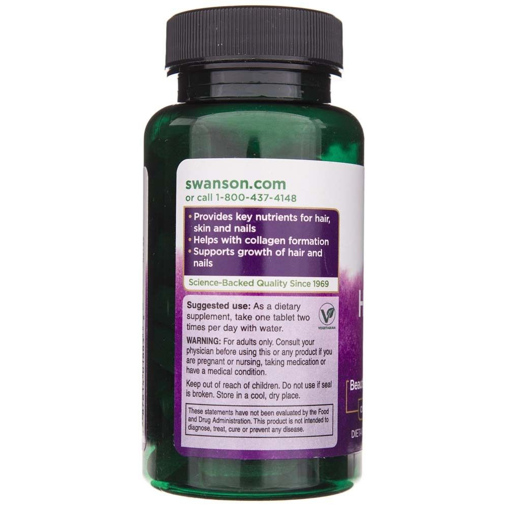 Groene fles met supplement voor haar, huid en nagels. Etiket met gebruiksinstructies en waarschuwingen.