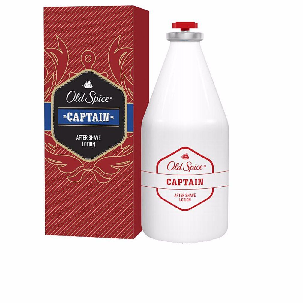 Flacon blanc et emballage rouge. Inscription: Old Spice Captain After Shave. Accents rouges et bleus.