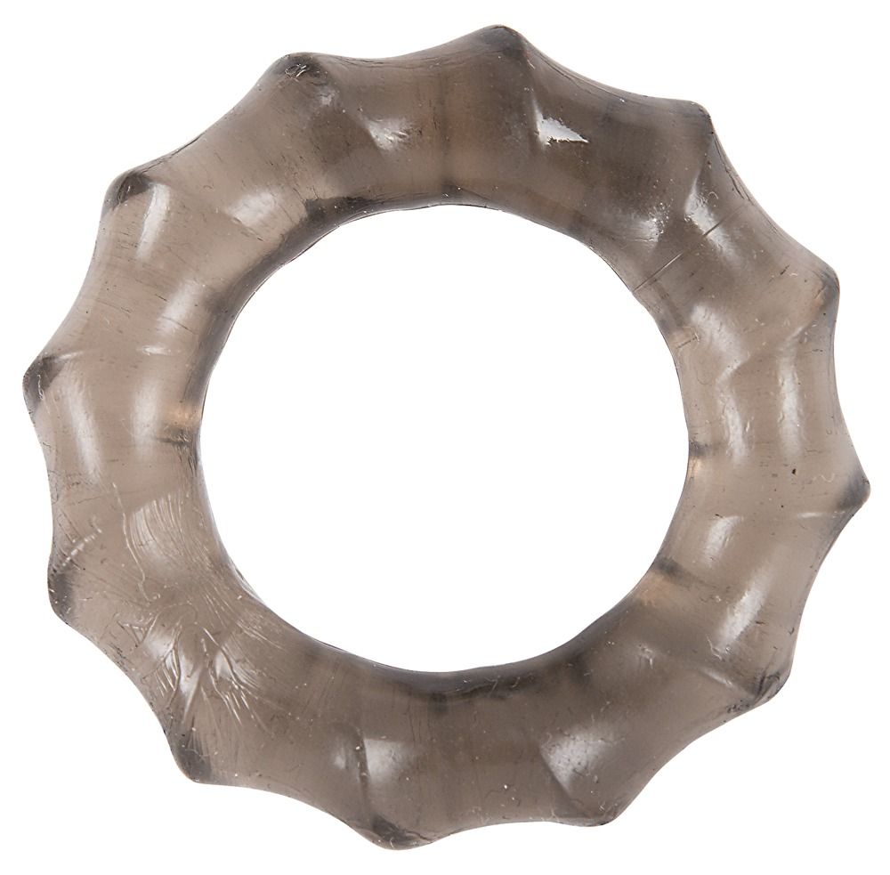 Zwarte, flexibele penisring met een golvend oppervlak. De ring heeft een ronde vorm met een gat in het midden.