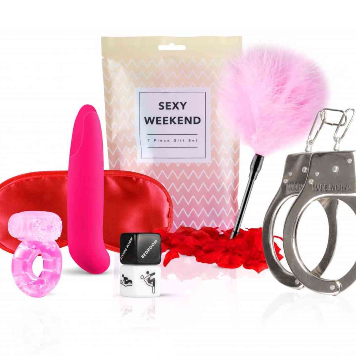 Coffret cadeau avec vibromasseur, masque pour les yeux, anneau, menottes, plumeau, huile de massage et emballage "SEXY WEEKEND".