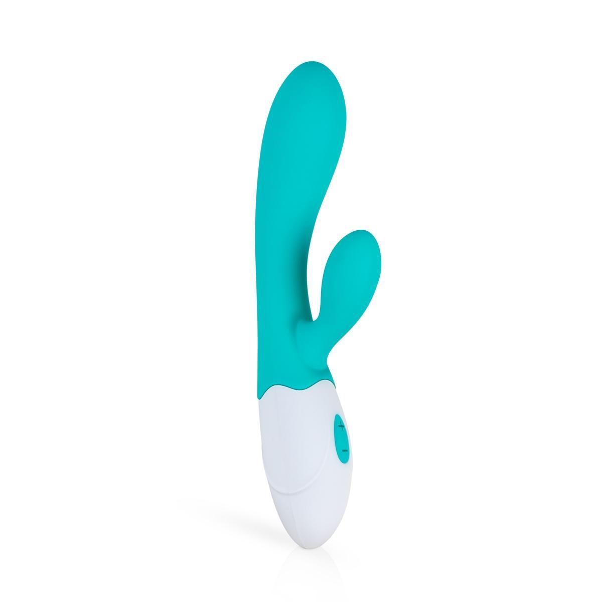 Turquoise-witte vibrator, gebogen vorm met twee uitsteeksels. Bedieningspaneel met knoppen.