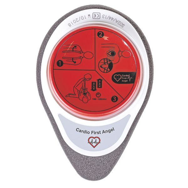 Dispositif médical Cardio First Angel. Bouton rouge avec instructions, cadre blanc, mousse grise. Texte: Cardio First Angel.