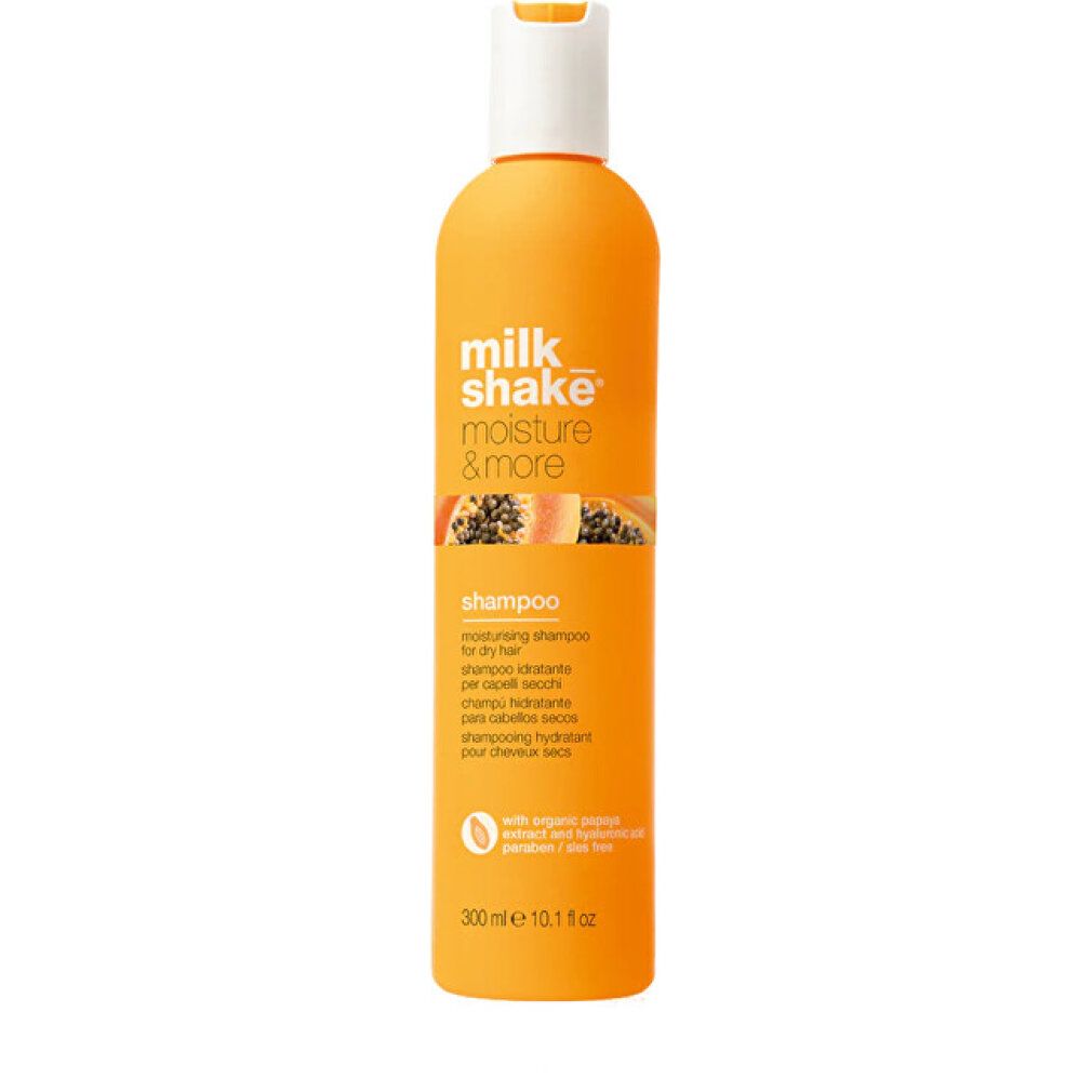 Bouteille orange milk_shake Moisture & More Shampooing Hydratant avec bouchon blanc. Contient de l'extrait de papaye.