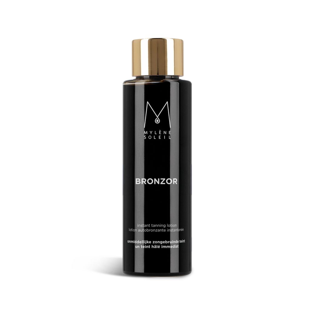 Zwarte fles met gouden dop. Opschrift: Mylène Soleil, Bronzor, Instant Tanning Lotion.