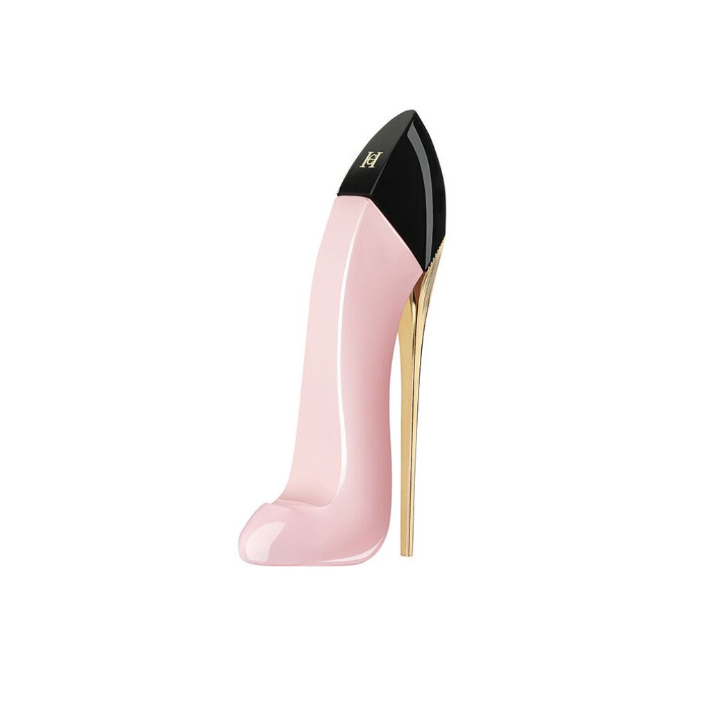 Parfumfles in de vorm van een roze pump met zwarte hak en gouden stiletto.