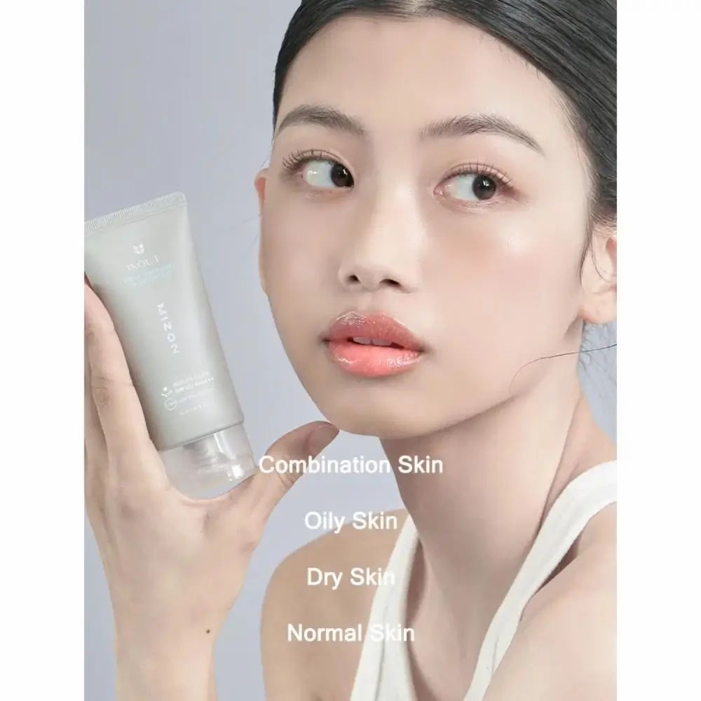 Vrouw houdt tube vast. Tekst: INOUT, MIZON. Tekst: Combination Skin, Oily Skin, Dry Skin, Normal Skin.