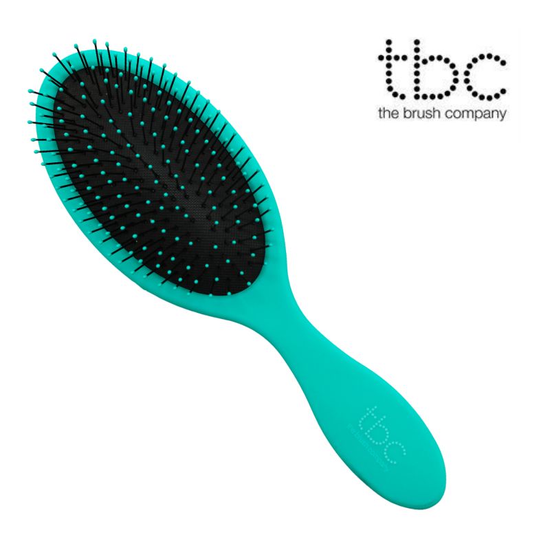 Brosse TBC Wet & Dry menthe turquoise avec poils noirs.