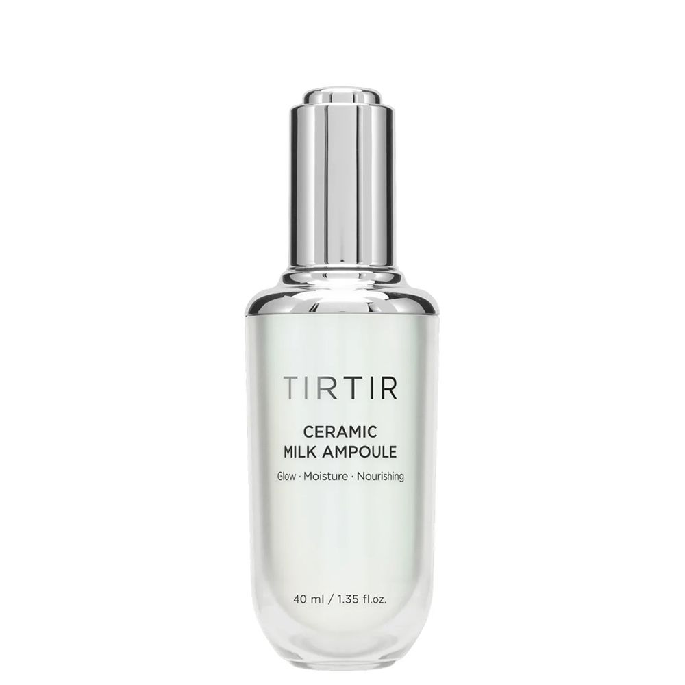 TIRTIR Ceramic Milk Ampoule in heldere glazen fles met zilveren applicator.