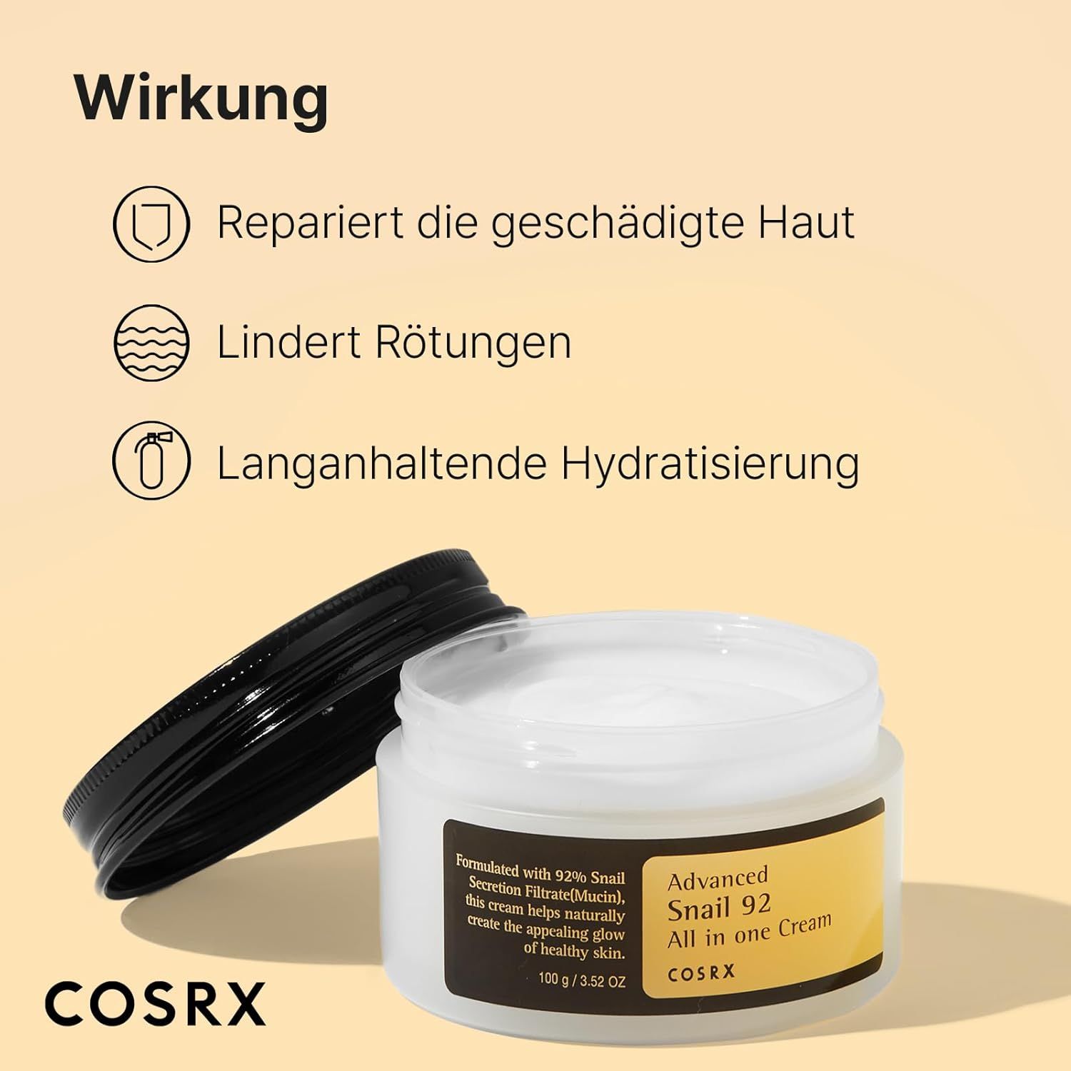Open COSRX slakkencrème pot met witte crème en zwart deksel ernaast.
