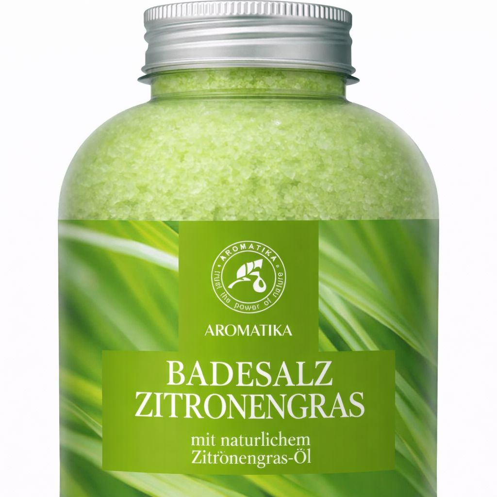 AROMATIKA Sel de bain Lemongrass dans une bouteille transparente avec bouchon argenté. Sel vert et étiquette verte avec des herbes.