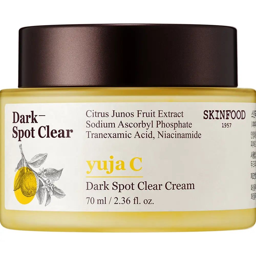Crèmepot met gele crème en bruin deksel. Opschrift: Dark Spot Clear, Yuja C, SKINFOOD. Productinformatie en ingrediënten zijn ook zichtbaar.