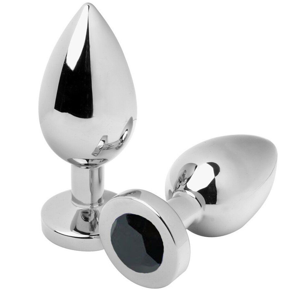 Deux plugs anaux métalliques. Tête en forme de goutte, pierre noire à la base. Surface brillante.