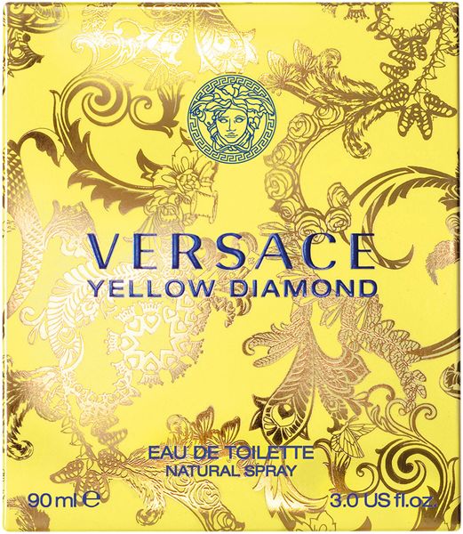Gele verpakking van Versace Yellow Diamond. Logo, tekst en decoratief patroon. Tekst: Eau de Toilette.