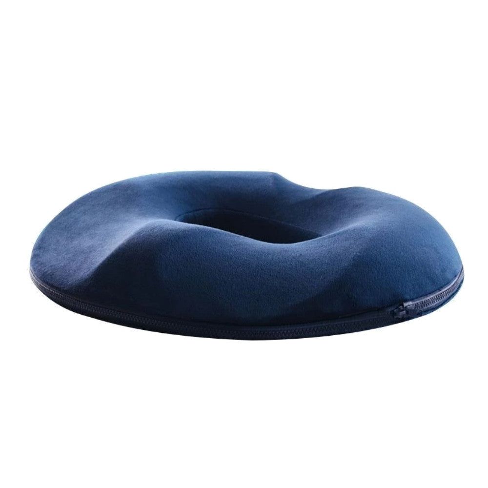 Coussin bleu en forme d'anneau, avec une découpe. Fermeture éclair.