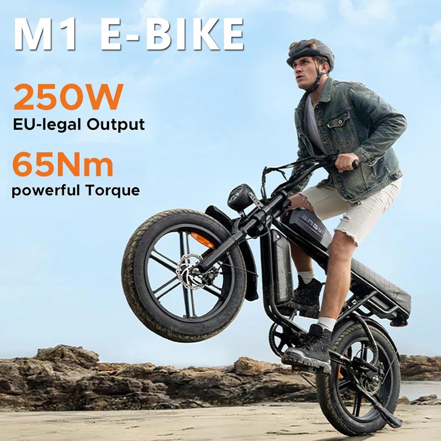 Vélo électrique noir sur le sable. Texte : "M1 E-BIKE 250W EU-legal Output 65Nm powerful Torque". Une personne fait du vélo.
