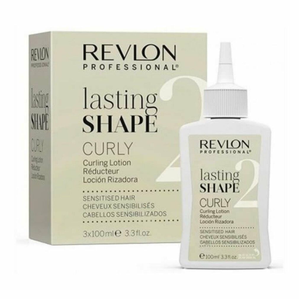Een fles en een doos Revlon Lasting Shape 2 Curly Lotion. Opschrift: Curly, Gevoelig haar.