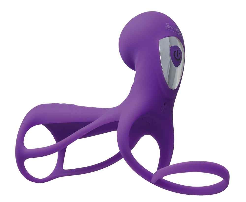 Sextoy violet en forme incurvée avec anneau. Panneau de commande argenté et bouton marche/arrêt.