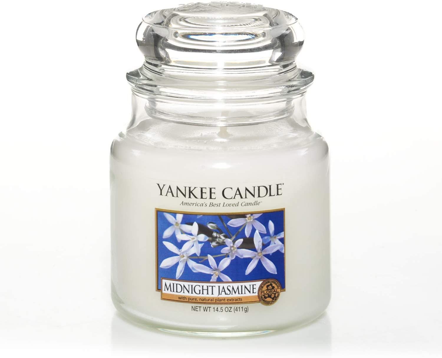 Yankee Candle Midnight Jasmine geurkaars. Glazen pot met deksel. Blauw etiket met bloemmotief. Gewicht: 411g.