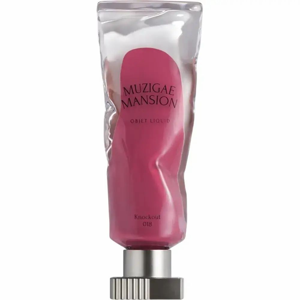 Vloeibare lippenstift in transparante tube. Merk: MUZIGAE MANSION. Kleur: Knockout 018. Metalen dop.