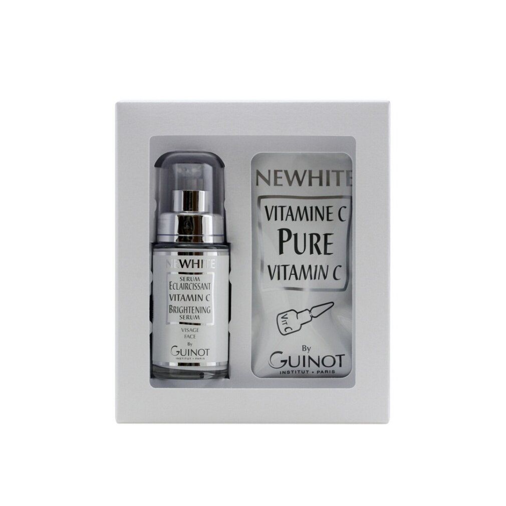 Guinot Newhite Serum in geschenkverpakking. Serumfles en vitamine C-ampul. Verpakking met productnaam en merk. Witte achtergrond.