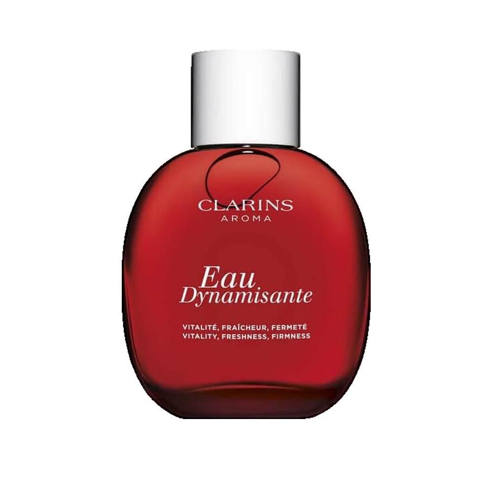 Flacon rouge avec bouchon blanc. Inscription: Clarins Aroma, Eau Dynamisante. Sous-titre: Vitalité, fraîcheur, fermeté.
