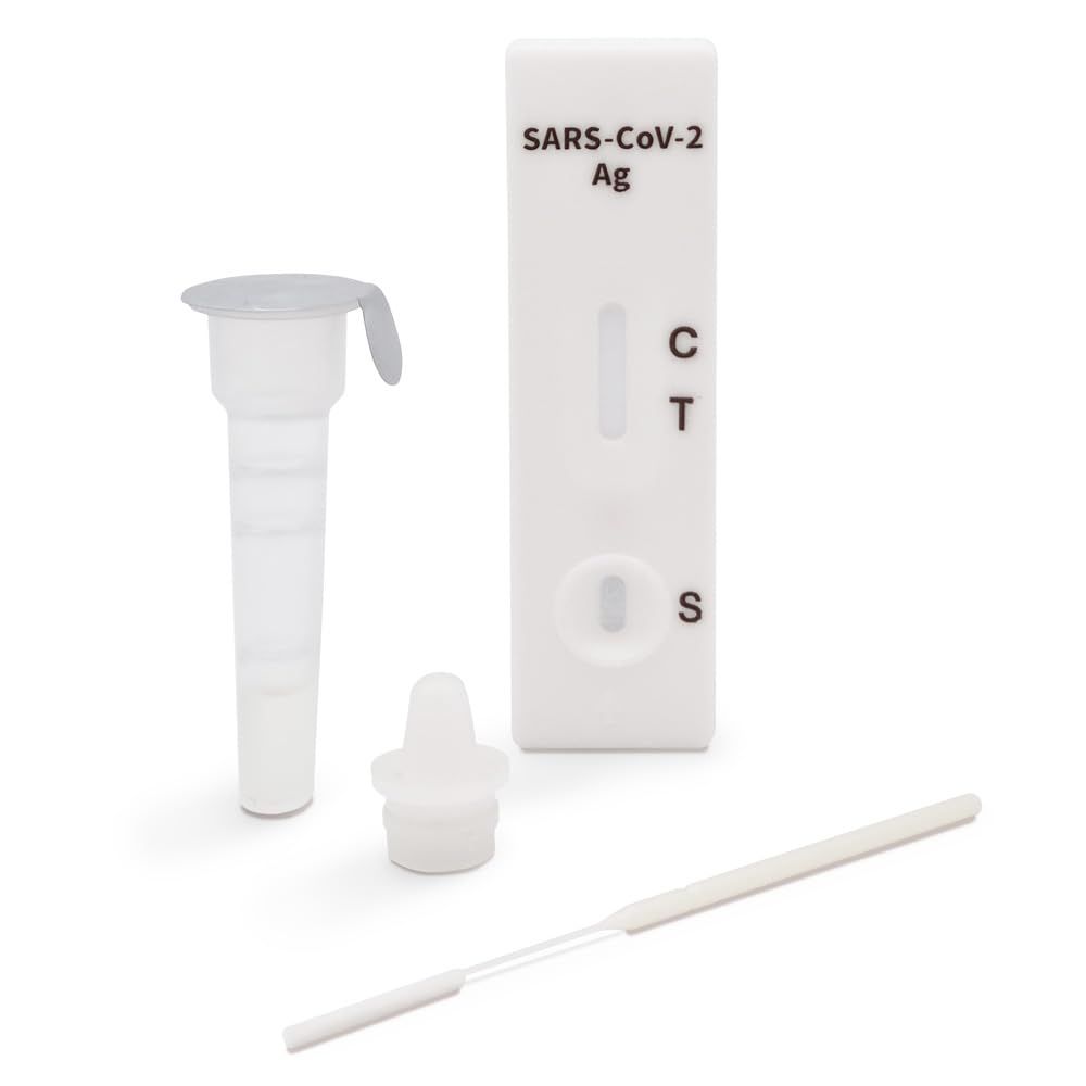 Composants du kit de test: bandelette de test, tube avec liquide, compte-gouttes, écouvillon.